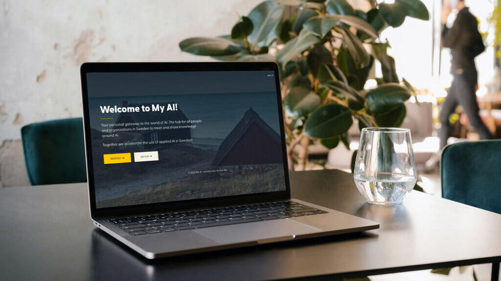 A picture of a laptop with the website My AI showing